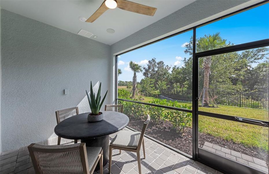 Exterior details and patio area of a home in Shores at Stillwater, Englewood (Image 3).
