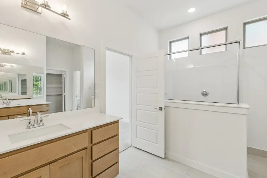 Primary Bathroom in the Da Vinci II home plan by Trophy Signature Homes – REPRESENTATIVE PHOTO
