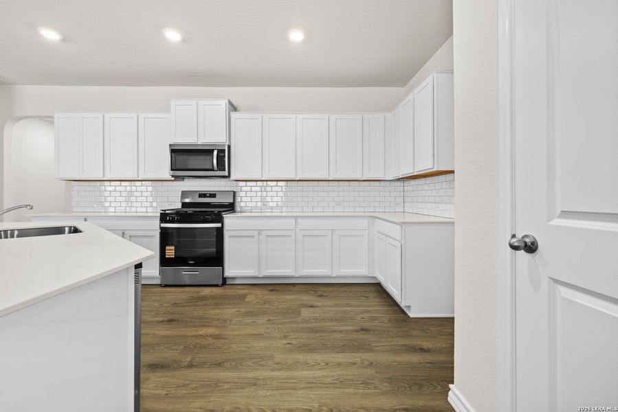 Furnished interior view inside a new home in Redbird Ranch, San Antonio (Image 7).
