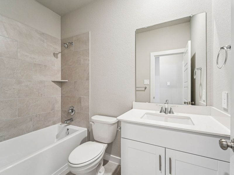 Furnished interior view inside a new home in Granger Pointe - Premier Series, Conroe (Image 6).