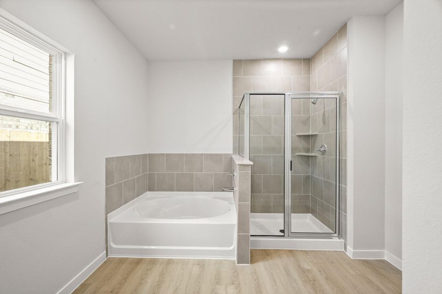 Furnished interior view inside a new home in Sunterra, Katy (Image 5).