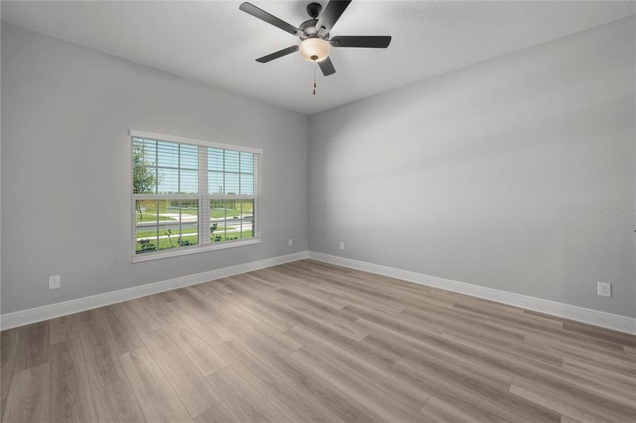 Spacious, unfurnished interior of a new home in Gum Lake Preserve, Lake Alfred (Image 22).
