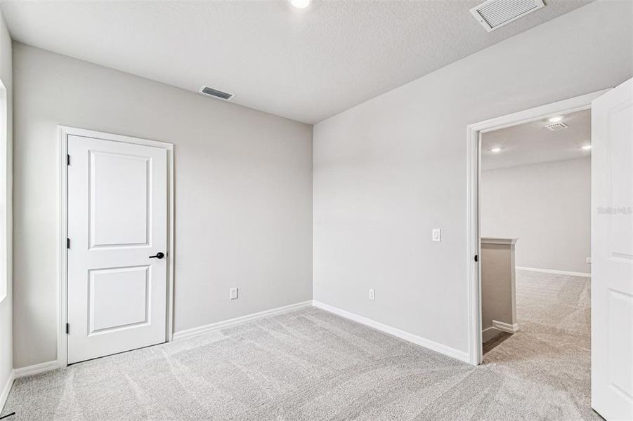 Spacious, unfurnished interior of a new home in Oakfield at Mount Dora Village Series, Mount Dora (Image 40).