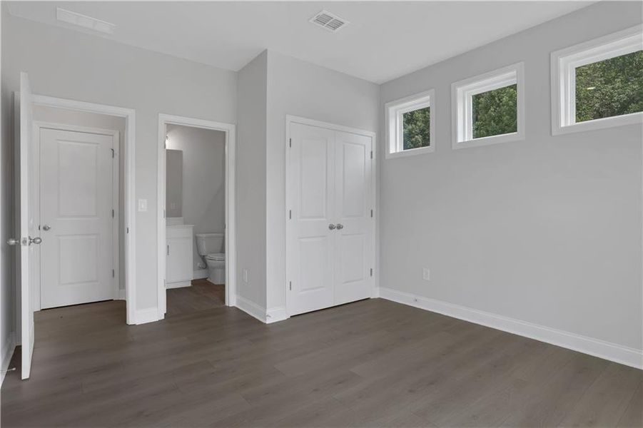 Spacious, unfurnished interior of a new home in The Paddocks at Doc Hughes, Buford (Image 20).