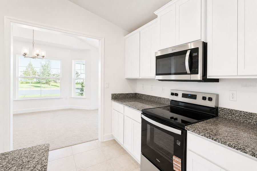 Furnished interior view inside a new home in Harmony Central, St. Cloud (Image 9).