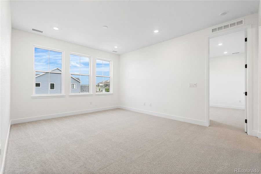 Spacious, unfurnished interior of a new home in Stargaze at Solstice, Littleton (Image 37).