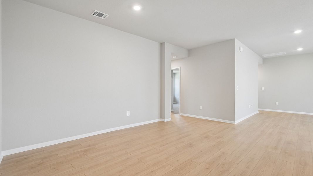 Spacious, unfurnished interior of a new home in Carillon, Manor (Image 19).
