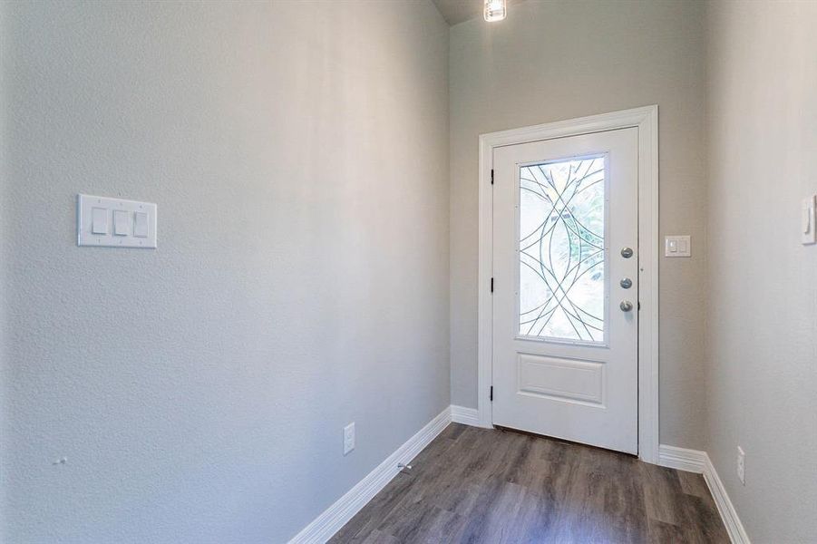 Bright open foyer with beautiful flooring - welcome!