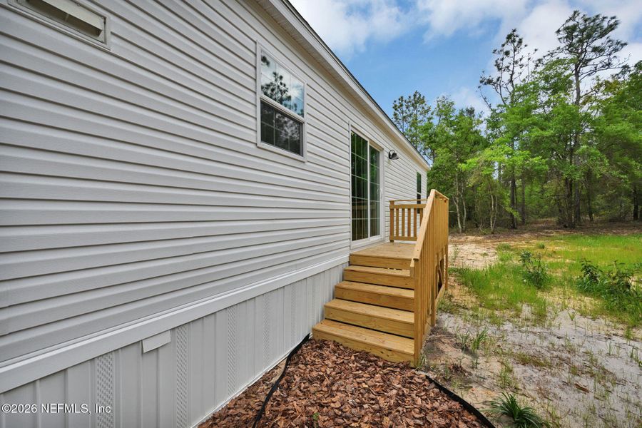 Exterior details and patio area of a home in , Hawthorne (Image 21).