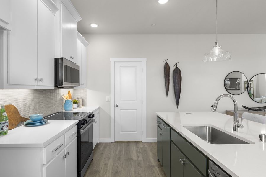 Furnished interior view inside a new home in Wildridge, Oak Point (Image 13).