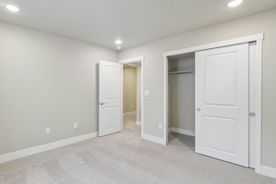 Spacious, unfurnished interior of a new home in The Trails at Aspen Ridge, Colorado Springs (Image 58).