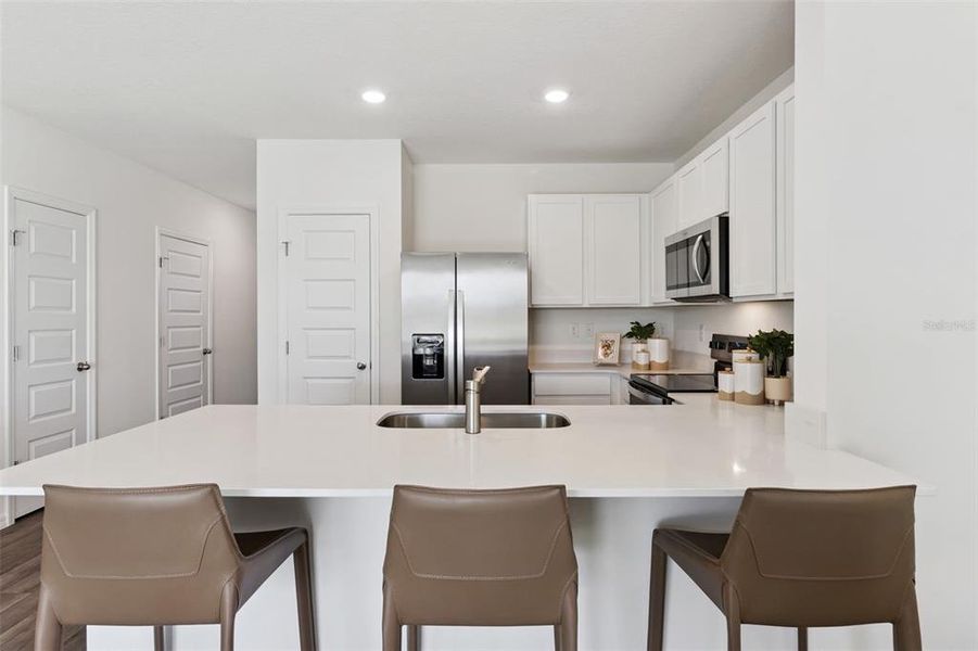 Furnished interior view inside a new home in Danbury at Ridgewood Lakes, Davenport (Image 15). Furnished interior view inside a new home in Danbury at Ridgewood Lakes, Davenport (Image 15).