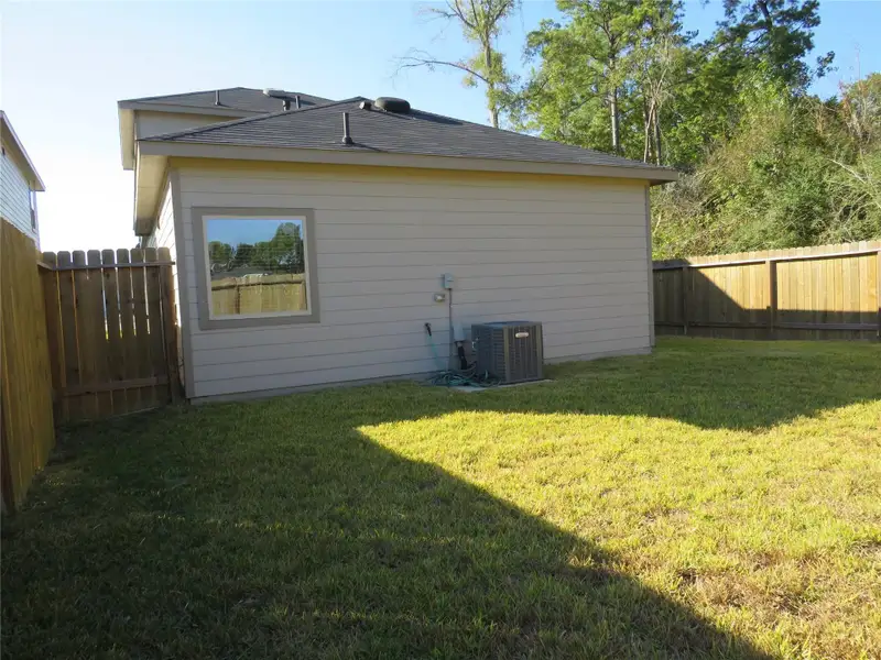 Exterior details and patio area of a home in , Houston (Image 3).