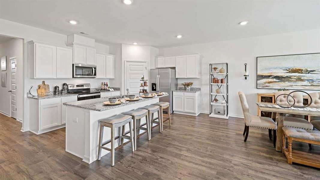 Furnished interior view inside a new home in The Preserve at Agricultural Village, Perry (Image 3). Furnished interior view inside a new home in The Preserve at Agricultural Village, Perry (Image 3).