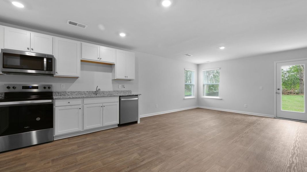 Representative furnished interior of a home built from the SULLIVAN by D.R. Horton in Evergreen, Holly Hill (Image 4).