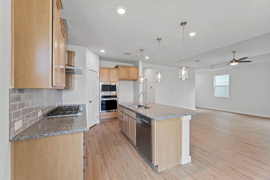 Representative furnished interior of a home built from the Sabrine by Hakes Brothers in Highland Ridge, New Braunfels (Image 14).