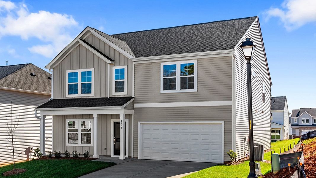 Front exterior of a new home in Hanes Lake, Winston-Salem, NC, highlighting curb appeal (Image 23).
