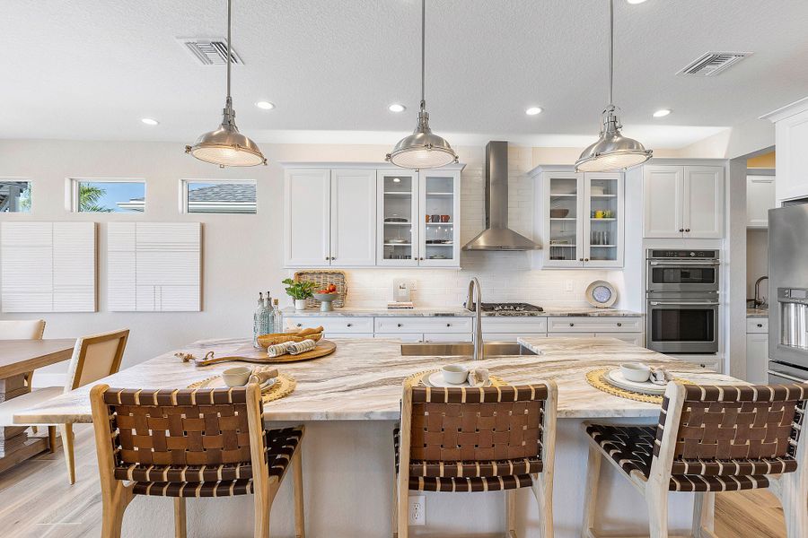 Representative furnished interior of a home built from the Charlotte by William Ryan Homes in The Sanctuary – Royal Collection, Punta Gorda (Image 12). Representative furnished interior of a home built from the Charlotte by William Ryan Homes in The Sanctuary – Royal Collection, Punta Gorda (Image 12).