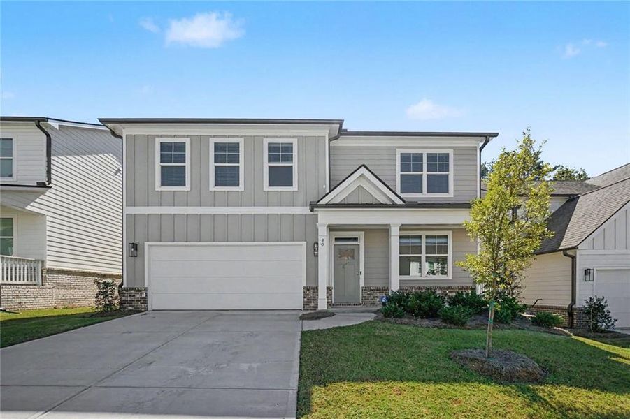 Front exterior of a new home in Hamptons at Riverwood South, Dallas, GA, highlighting curb appeal (Image 24).