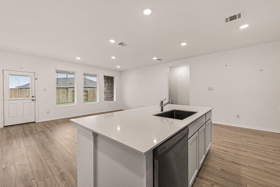 Furnished interior view inside a new home in Sunterra, Katy (Image 10).