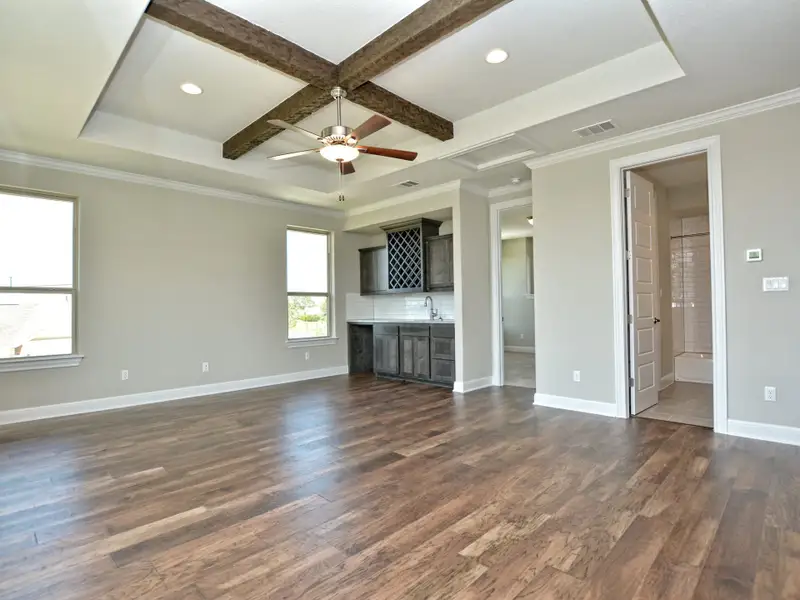 Representative unfurnished interior of a home built from the Santa Barbara II by Giddens Homes in Scofield Farms Estates, Georgetown (Image 100).