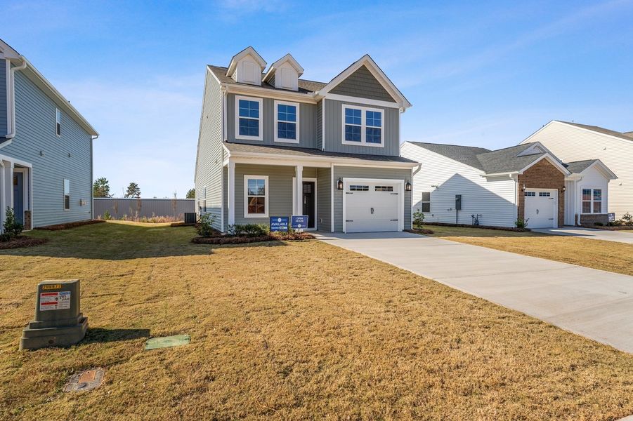 Front exterior of a new home in Tucker Ridge, Pendleton, SC, highlighting curb appeal (Image 20). Front exterior of a new home in Tucker Ridge, Pendleton, SC, highlighting curb appeal (Image 20).