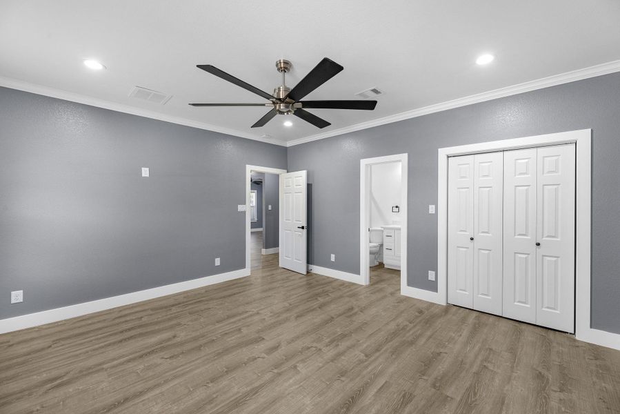 Another view of the primary bedroom.