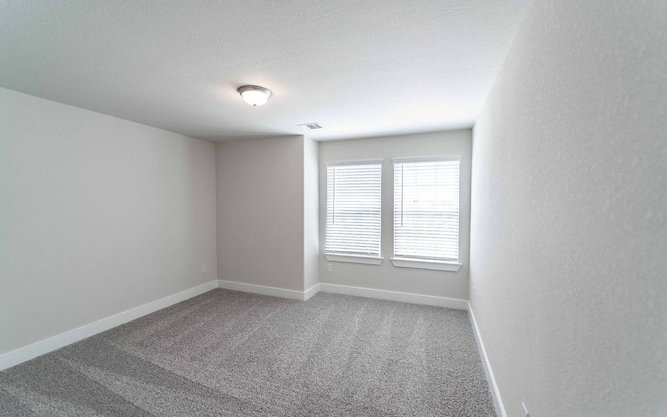 Spacious, unfurnished interior of a new home in Canterra Creek, Rosharon (Image 48).