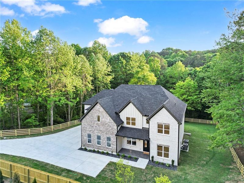 Front exterior of a new home in , Dacula, GA, highlighting curb appeal (Image 30). Front exterior of a new home in , Dacula, GA, highlighting curb appeal (Image 30).