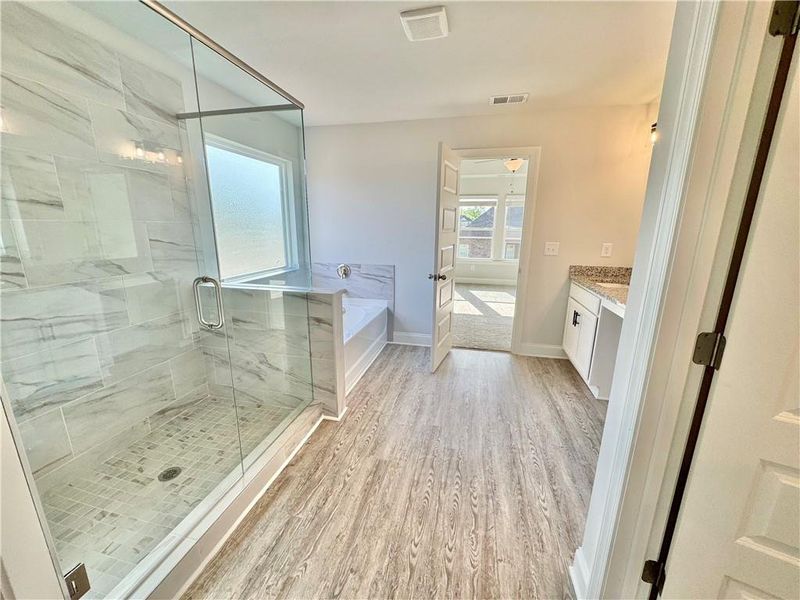 Spacious, unfurnished interior of a new home in , Gray (Image 36).