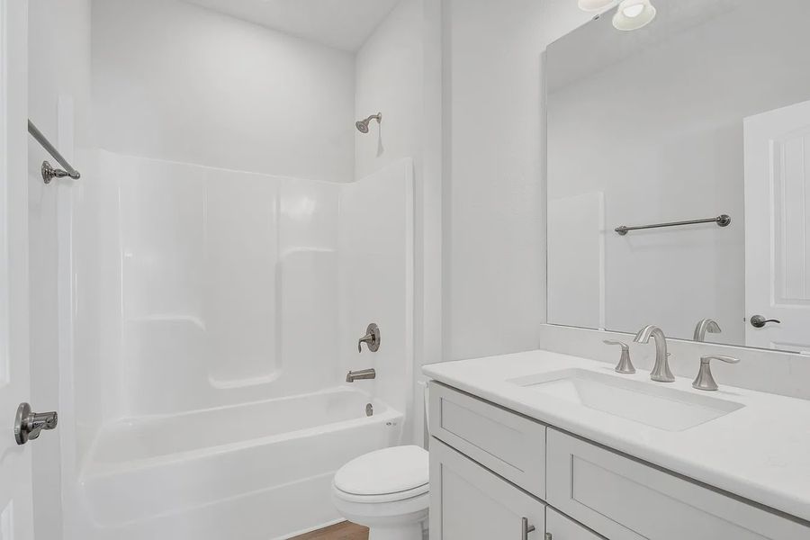 Furnished interior view inside a new home in The Bluffs at Lafayette, Freeport (Image 9).