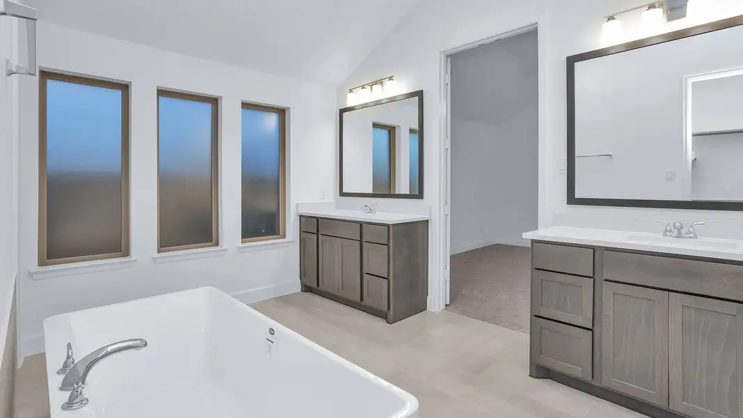 Furnished interior view inside a new home in Grand Central Park, Conroe (Image 7).