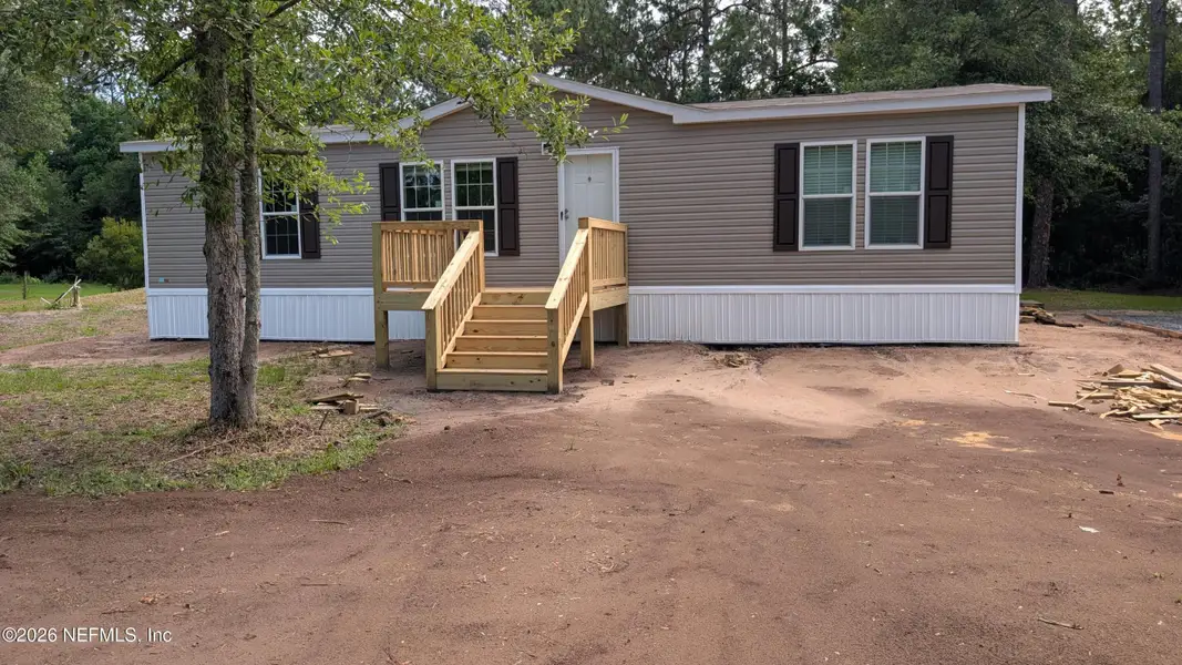 Exterior details and patio area of a home in , Callahan (Image 14).