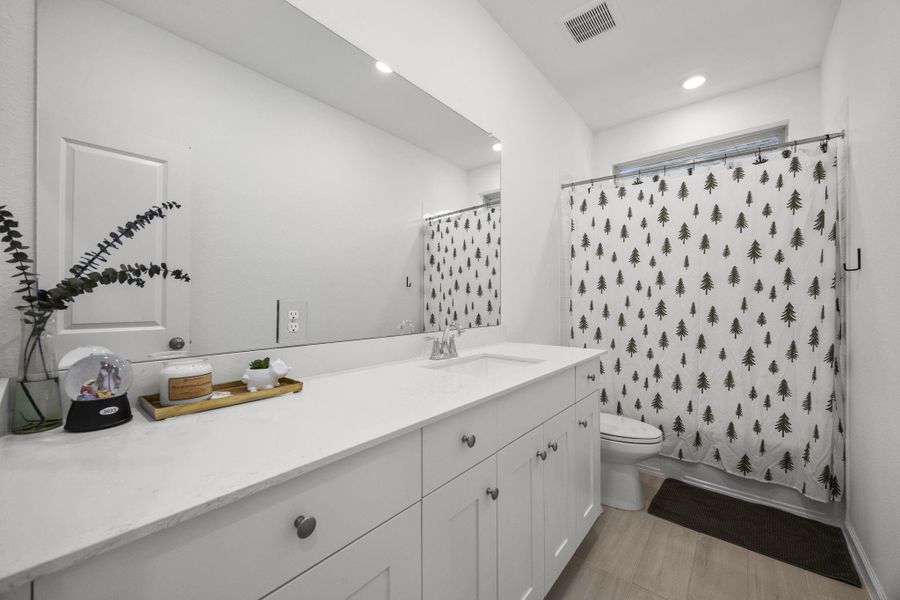 Furnished interior view inside a new home in Sunterra: Avante Collection, Katy (Image 13).