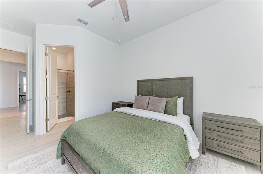 Furnished interior view inside a new home in Calusa Country Club, Lakewood Ranch (Image 40).