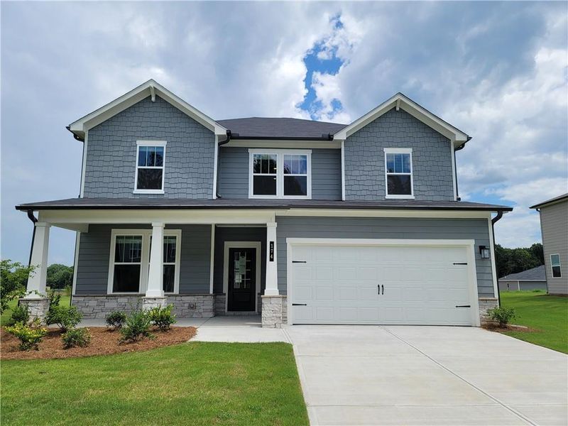 Front exterior of a new home in Reserve at Gum Springs, Jefferson, GA, highlighting curb appeal (Image 1). Front exterior of a new home in Reserve at Gum Springs, Jefferson, GA, highlighting curb appeal (Image 1).