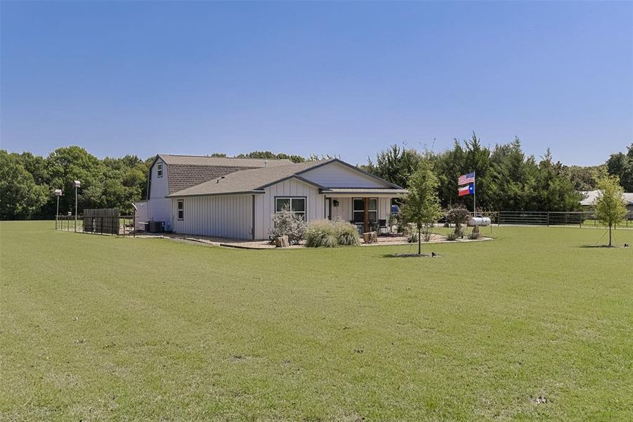 Front exterior of a new home in , Waxahachie, TX, highlighting curb appeal (Image 23). Front exterior of a new home in , Waxahachie, TX, highlighting curb appeal (Image 23).