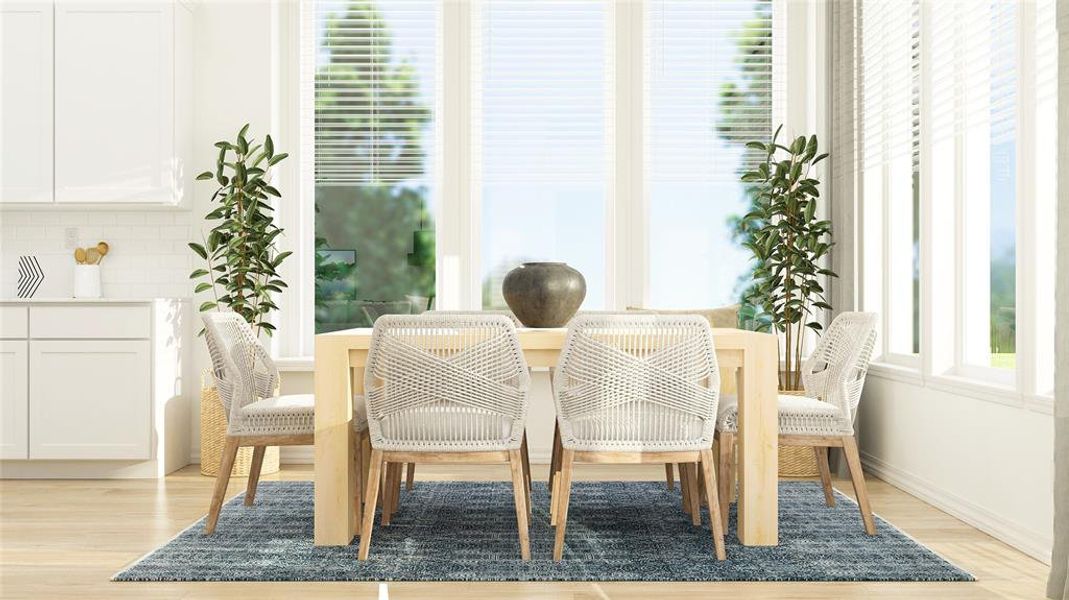 Dining room with light wood-type flooring