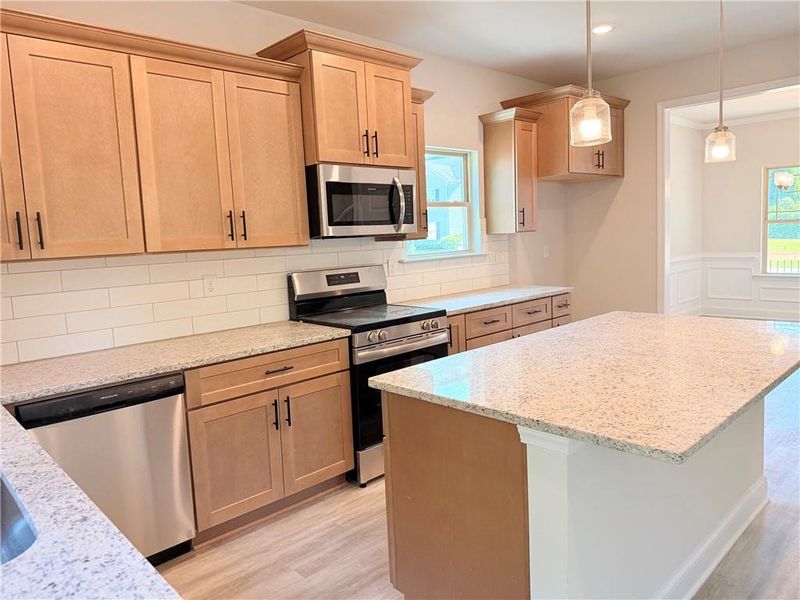 Furnished interior view inside a new home in Magnolia Villas, Cornelia (Image 10).