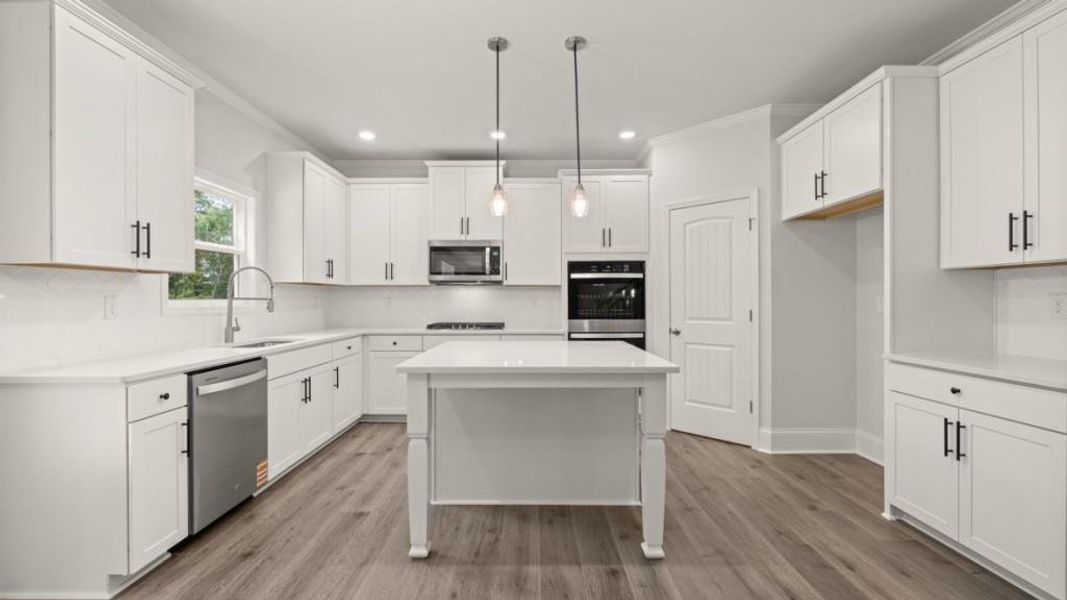 Furnished interior view inside a new home in Butner Estates, South Fulton (Image 3).