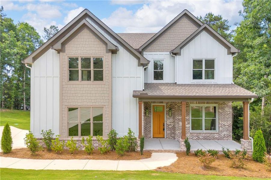 Front exterior of a new home in , Monroe, GA, highlighting curb appeal (Image 1). Front exterior of a new home in , Monroe, GA, highlighting curb appeal (Image 1).