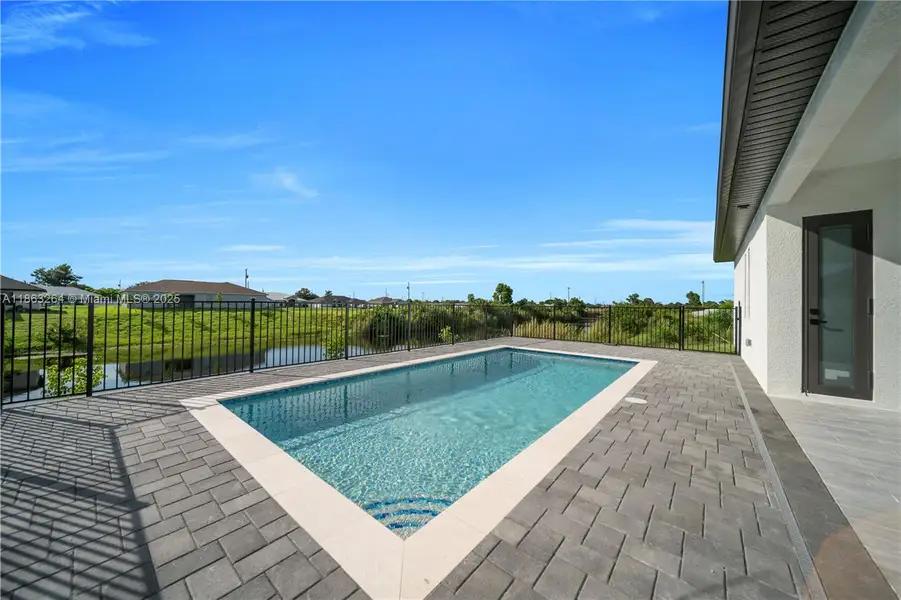 Front exterior of a new home in , Cape Coral, FL, highlighting curb appeal (Image 2).