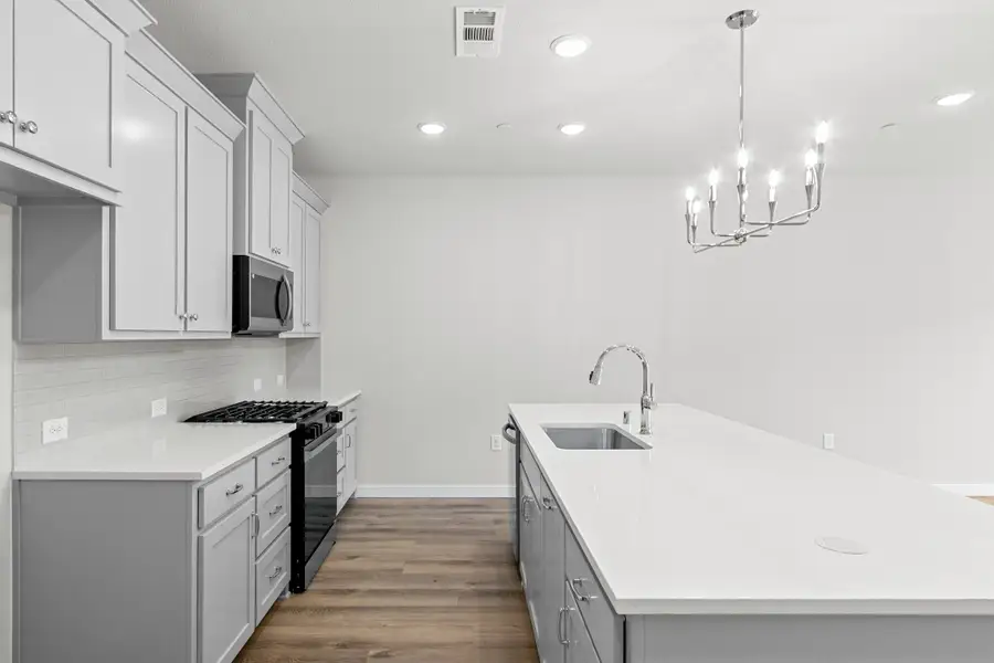 Furnished interior view inside a new home in Willow Grove Townhomes, Melissa (Image 11).