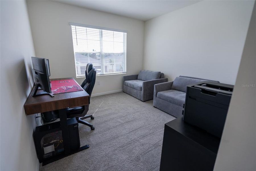 Furnished interior view inside a new home in Harmony at Lake Eloise, Winter Haven (Image 30).