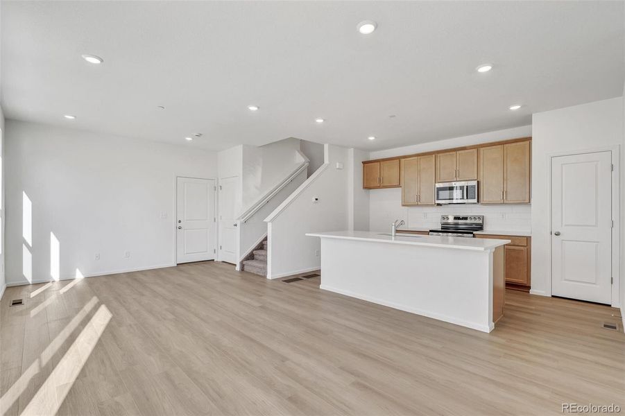 Furnished interior view inside a new home in Turnberry Villas, Commerce City (Image 10).