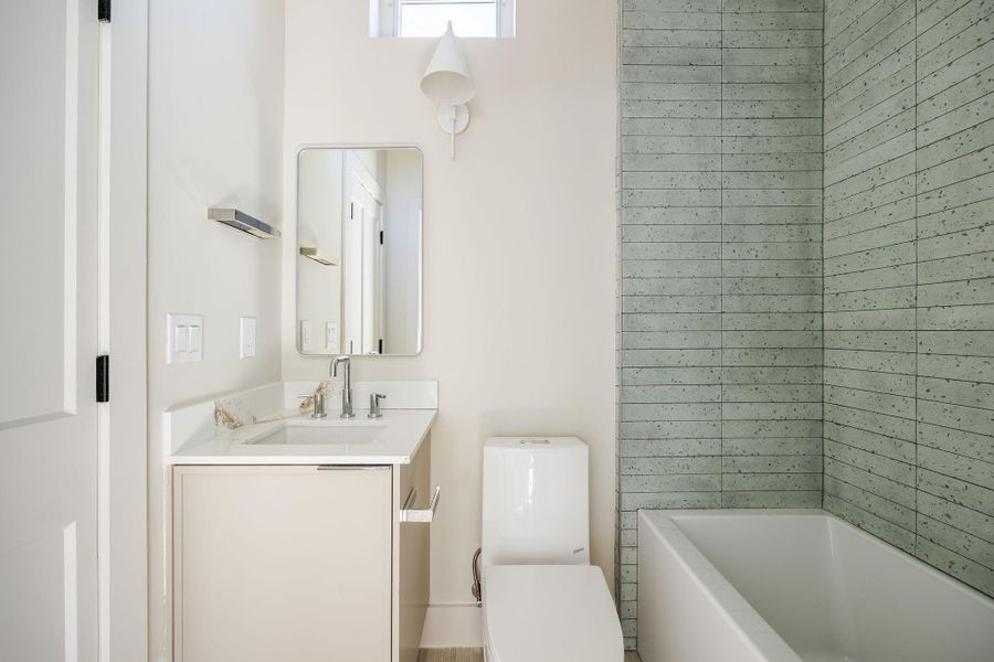 Full bathroom in the the studio space above the garage.