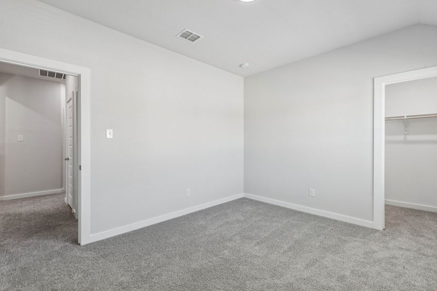 Bedroom in the Winters home plan by Trophy Signature Homes – REPRESENTATIVE PHOTO Bedroom in the Winters home plan by Trophy Signature Homes – REPRESENTATIVE PHOTO