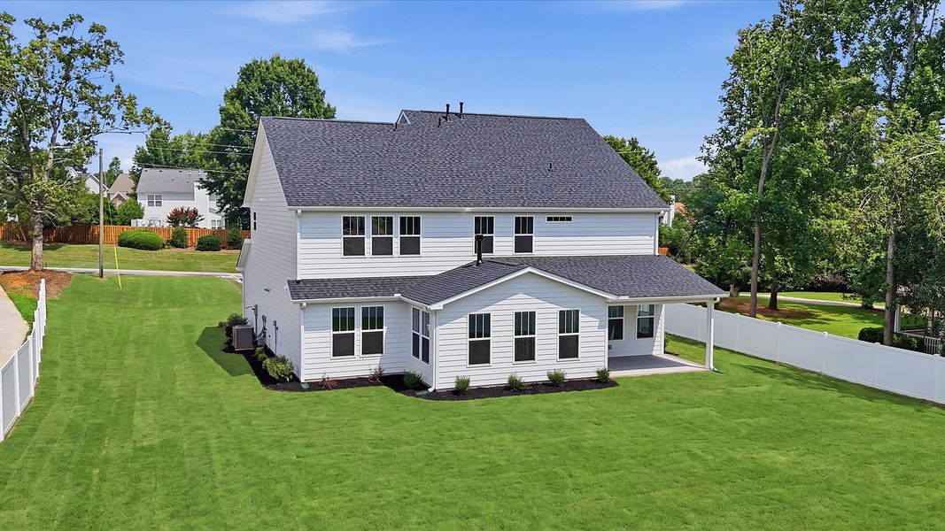 Highly functional rear covered porch adds memorable living space to this elegant home at Pelham Crossing