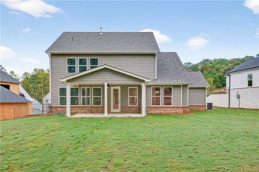 Exterior details and patio area of a home in The Manor at Gainesville Township, Gainesville (Image 3).