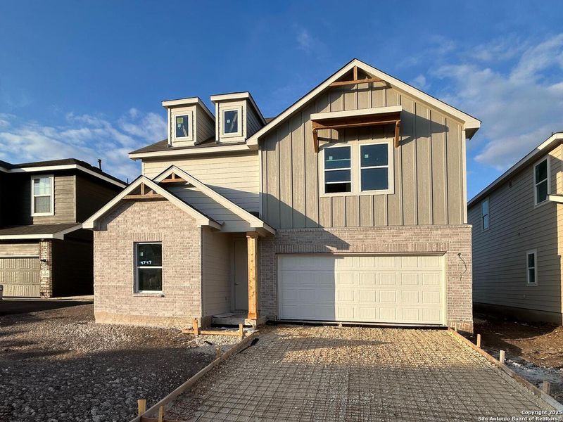 Front exterior of a new home in Enclave at Hennersby Hollow 50's, San Antonio, TX, highlighting curb appeal (Image 2). Front exterior of a new home in Enclave at Hennersby Hollow 50's, San Antonio, TX, highlighting curb appeal (Image 2).